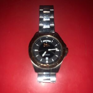 Men's Silver and Black Invicta Watch 6962